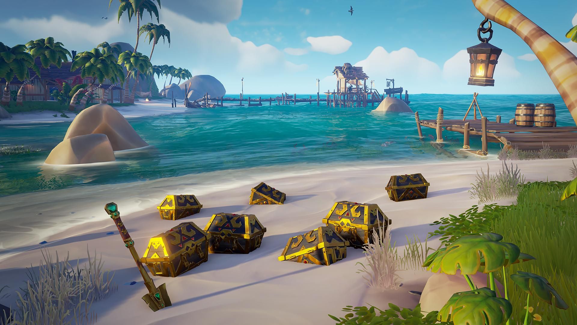 A group of Captain's Chests and a Gold Hoarder shovel scattered on a sunny beach.